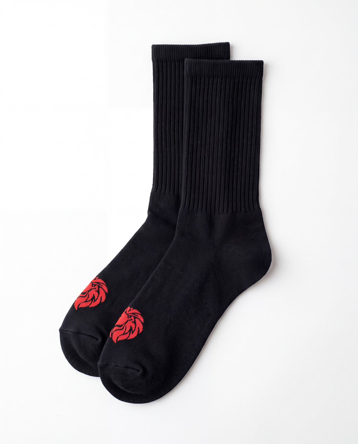 HercSocks Crew Socks in black, a pair laid flat with ribbing from the ankle up and the red lion head on each toe